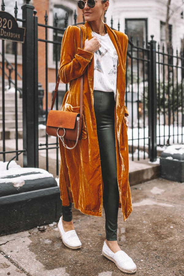 Mustard kimono coat worn with black trousers, viewed from the front to show the straight flowing panels.