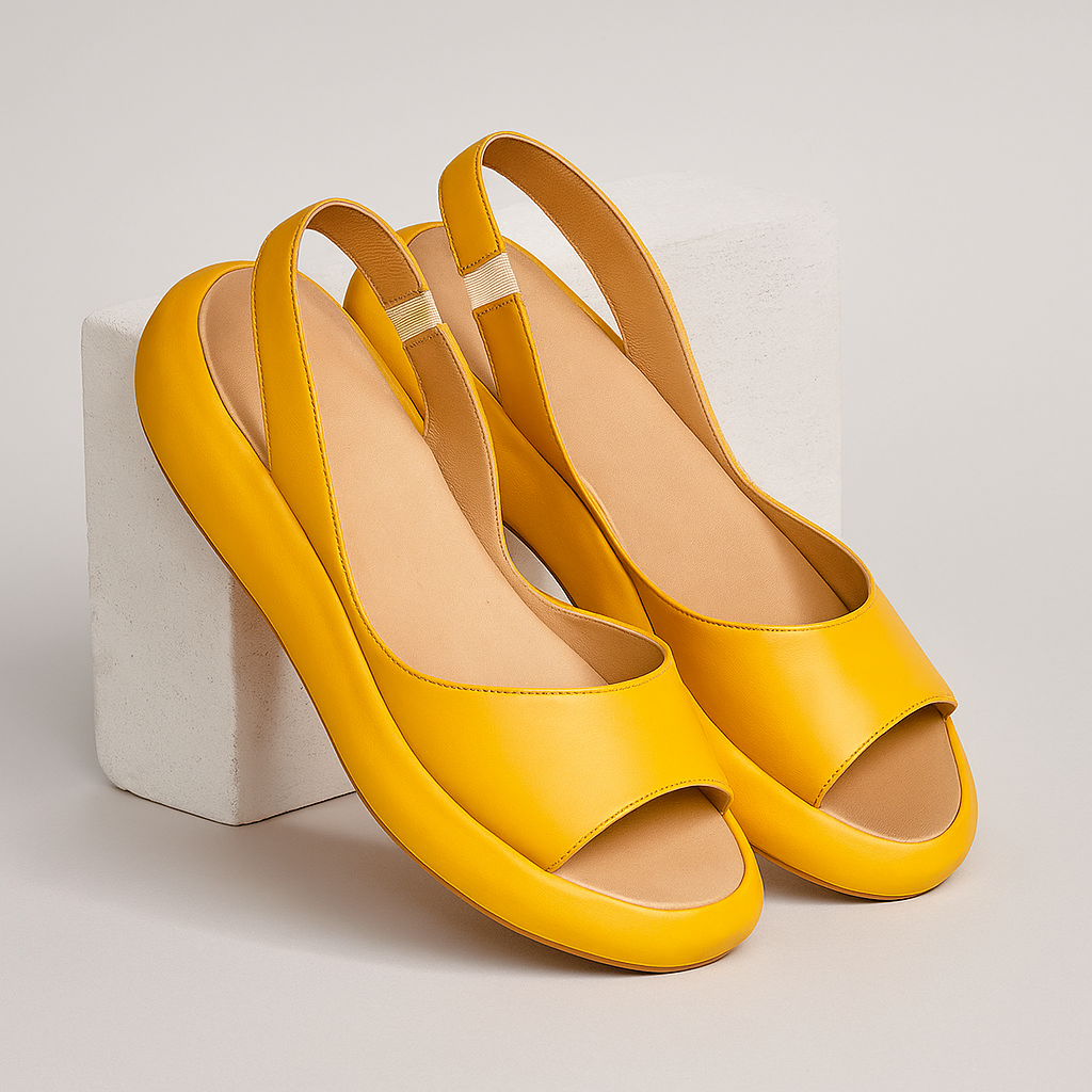 Bright yellow slingback wedge sandals displayed upright, clearly showing the open toes, heel straps, and platform wedge soles.