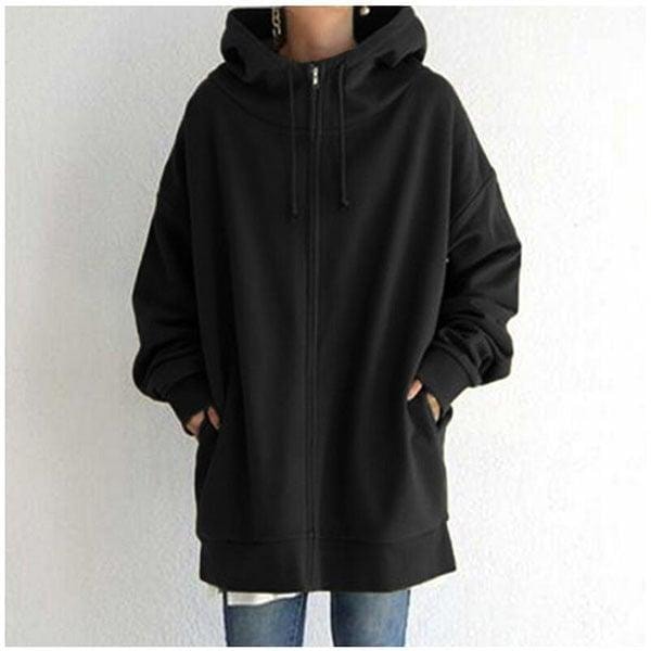 Front view of the oversized longline zip-up hoodie in black with the hood, drawstrings, full-length zip, and side pockets visible.
