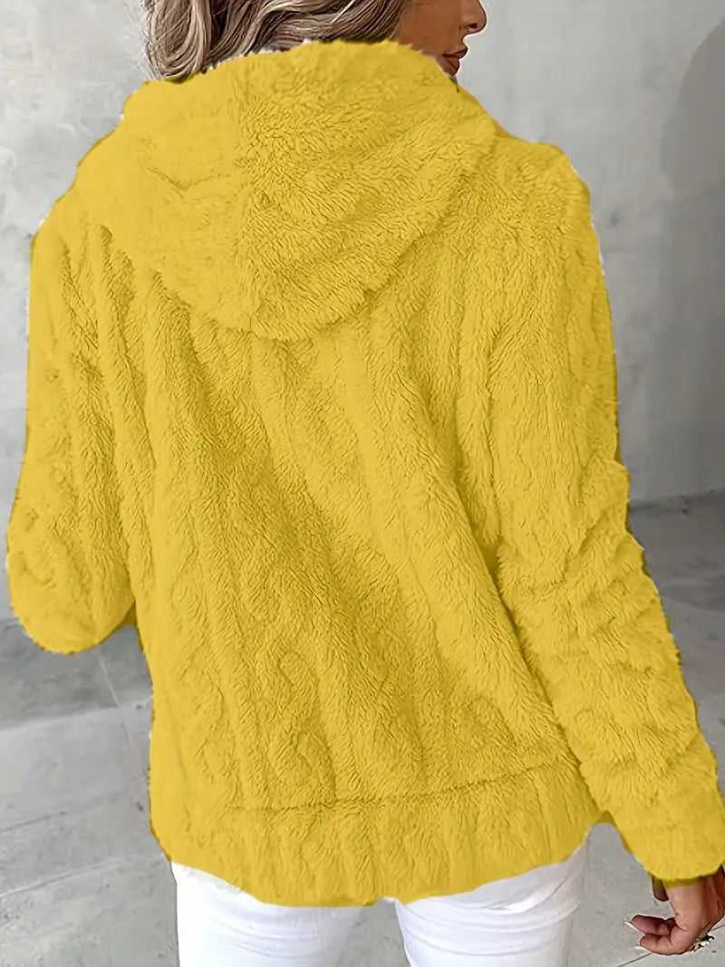 Back view of the yellow plush jacket highlighting the hood and long sleeves.