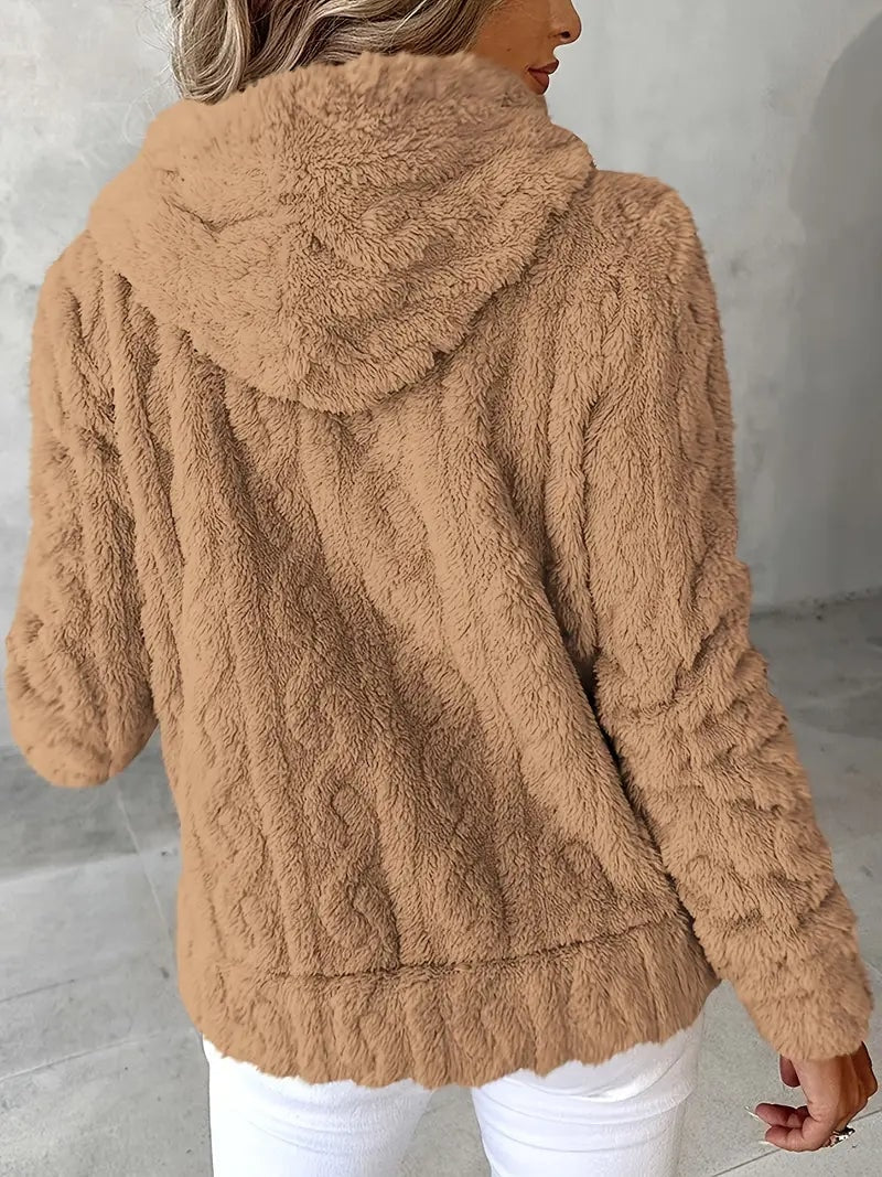 Back view of the tan plush hooded jacket with a softly textured body and lower hem.