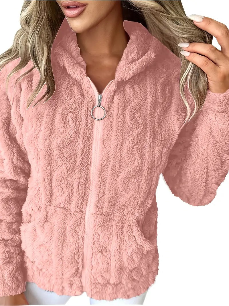 Closer front view of the pink plush hooded jacket with its zipper partly open and pockets visible.