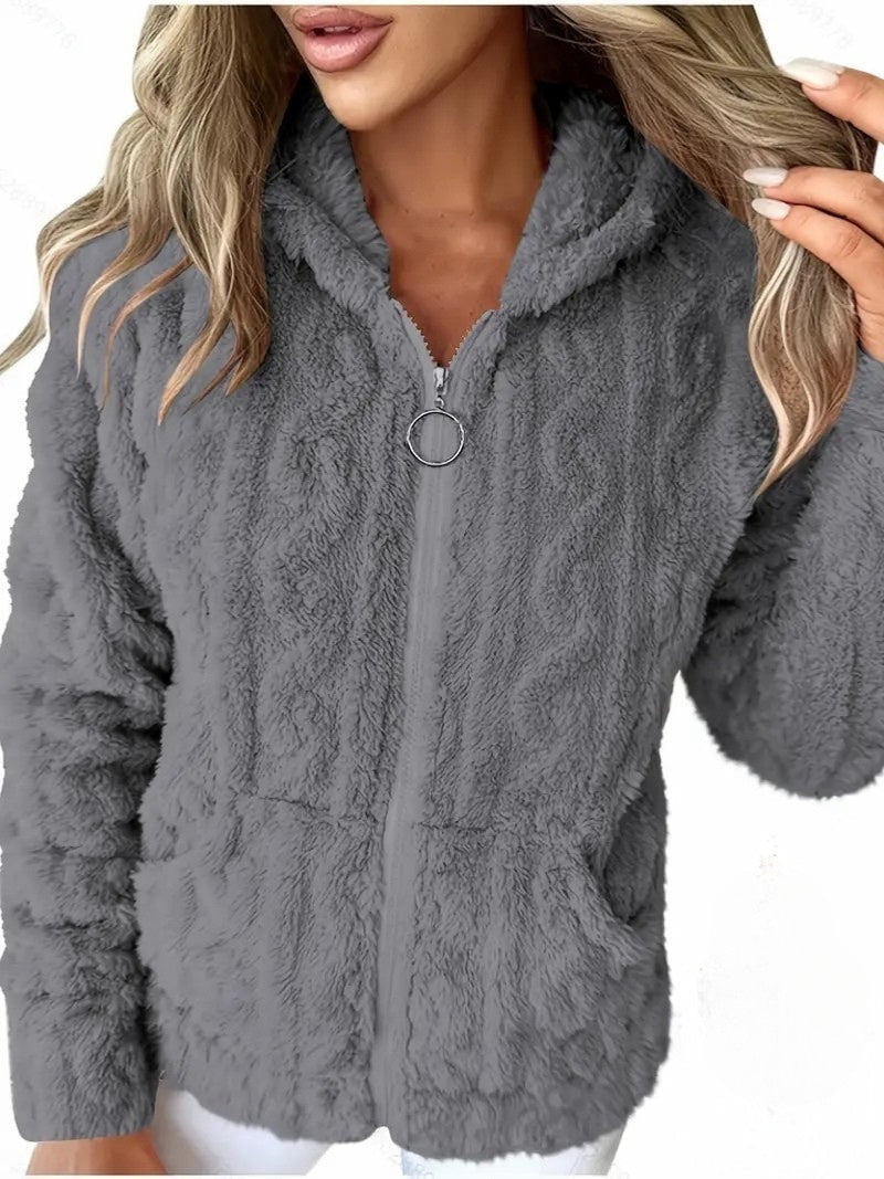 Dark gray plush hooded jacket shown closely from the front with a centered ring-pull zipper.