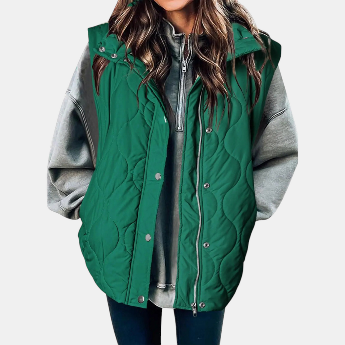 Bright green quilted hooded puffer vest with a longline silhouette and front zip and snap closures.