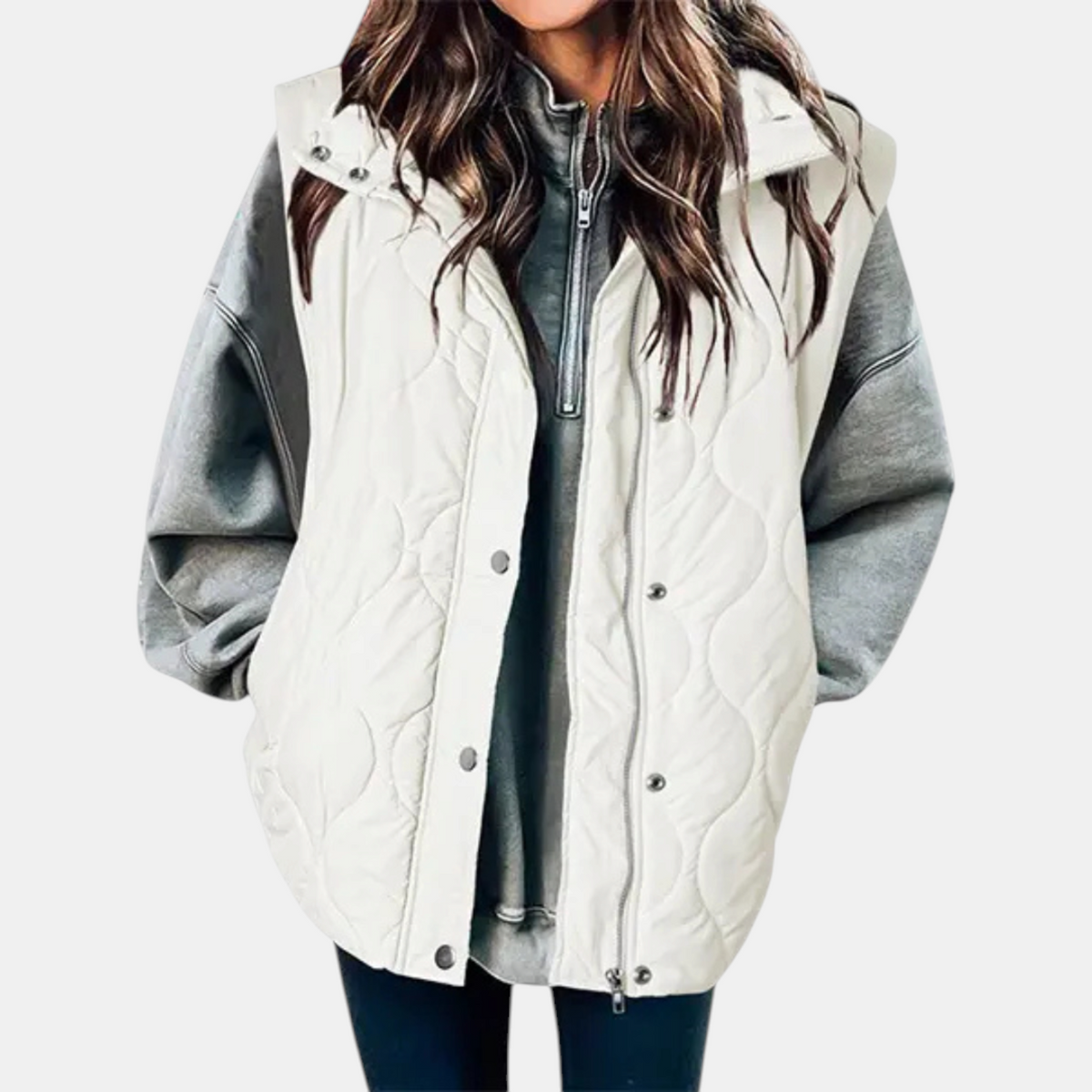 White hooded puffer vest with wave quilting, side pockets, and a longline cut.