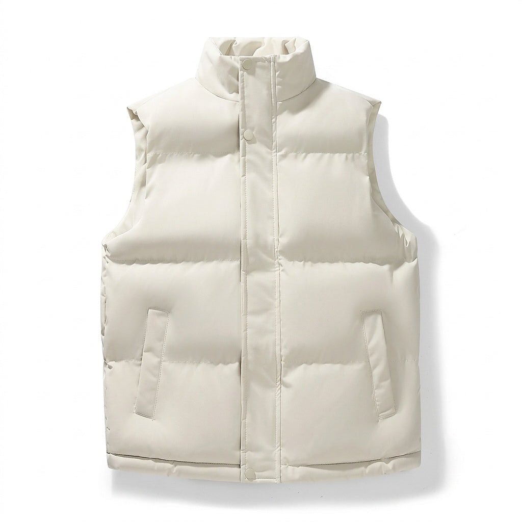 Cream puffer vest shown from the front, emphasizing the high collar, covered center closure, padded panels, and lower side pockets.
