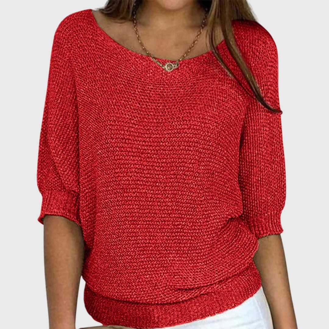 Red relaxed boat neck sweater with three-quarter sleeves, ribbed cuffs, and a wide ribbed hem.