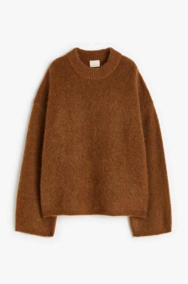 Brown crew-neck sweater displayed flat, clearly showing its straight hem, long sleeves, and simple relaxed shape.