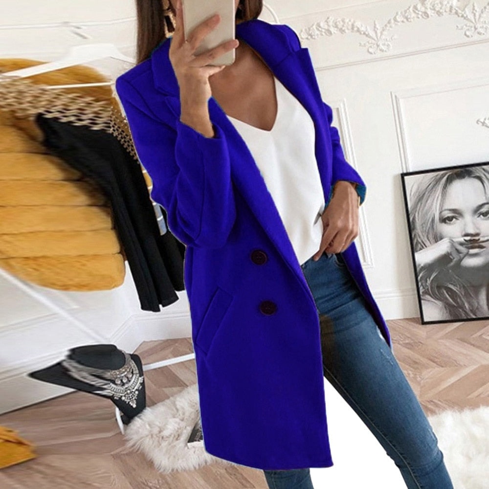 Vivid blue single-breasted coat with long sleeves, defined notch lapels, two-button front, and angled pockets.