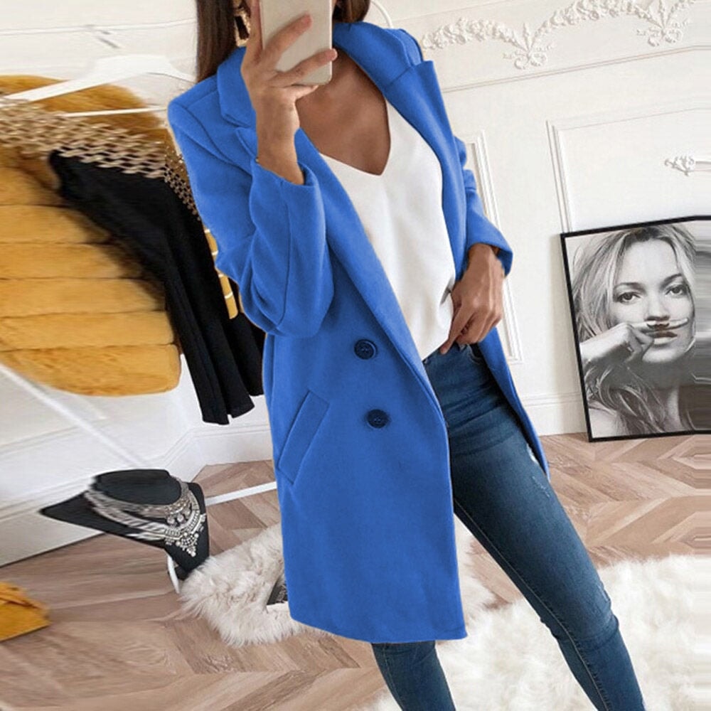 Bright blue tailored coat shown open, with long sleeves, notch lapels, two front buttons, and slanted hip pockets.