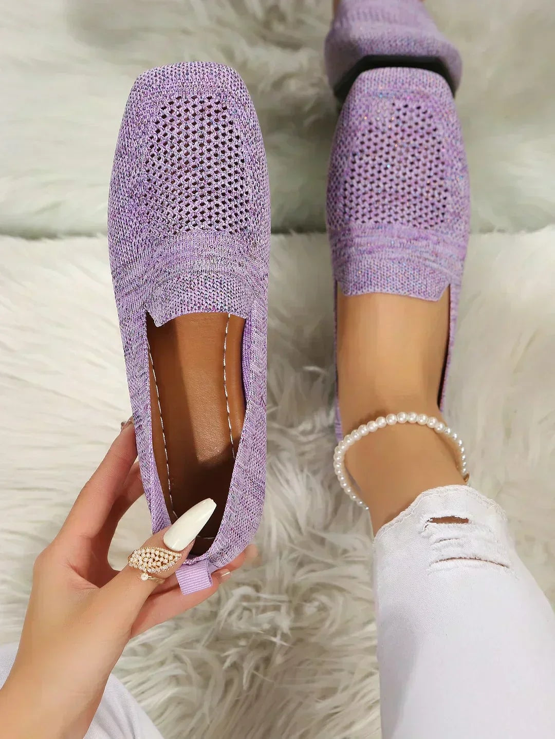 Lavender open-knit flats displayed from above, with square toes and easy slip-on openings visible.